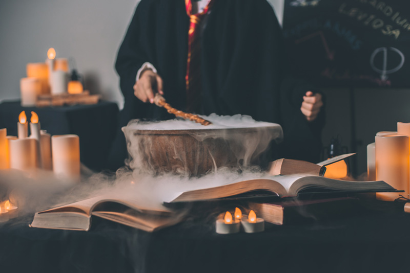 Witch making potion in a cauldron