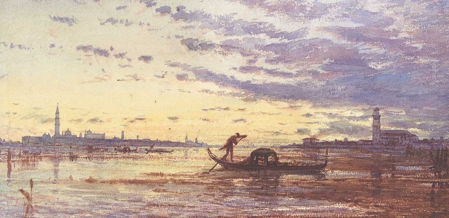 A gondola with two figures glides across a calm lagoon at sunset with a city skyline in the distance.
