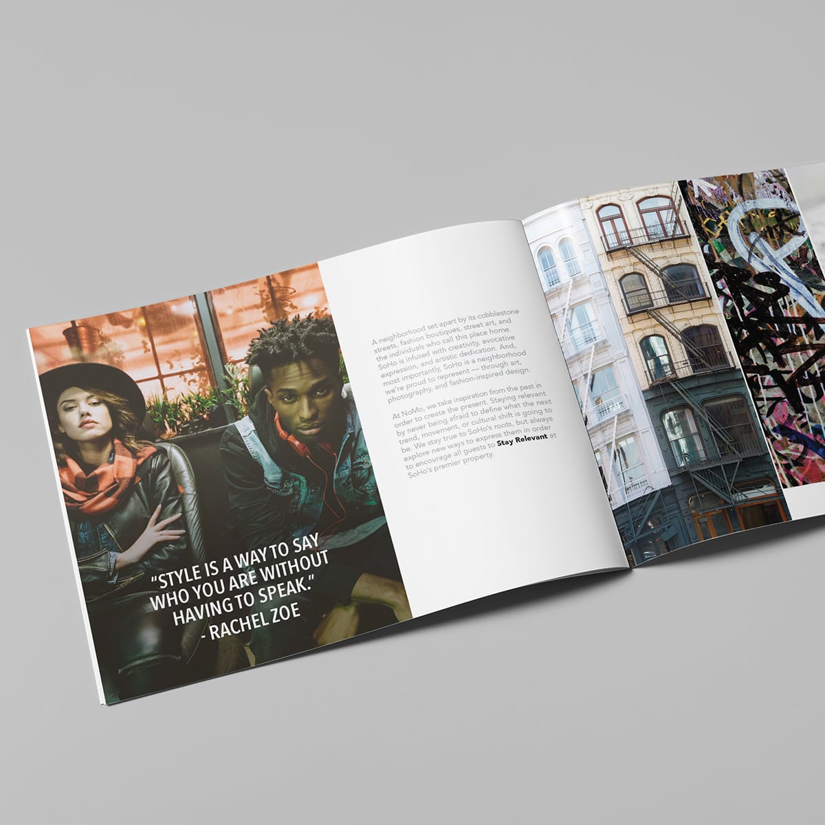 Open magazine with a quote on fashion, two stylish people, and city building photos on a gray background.