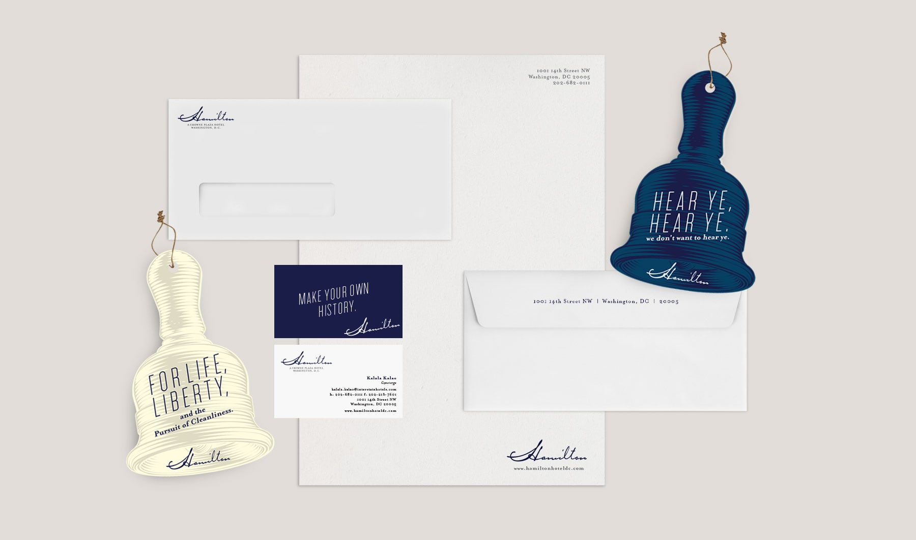 Stationery set with envelopes, letterhead, cards, and two bell-shaped tags with historic quotes.