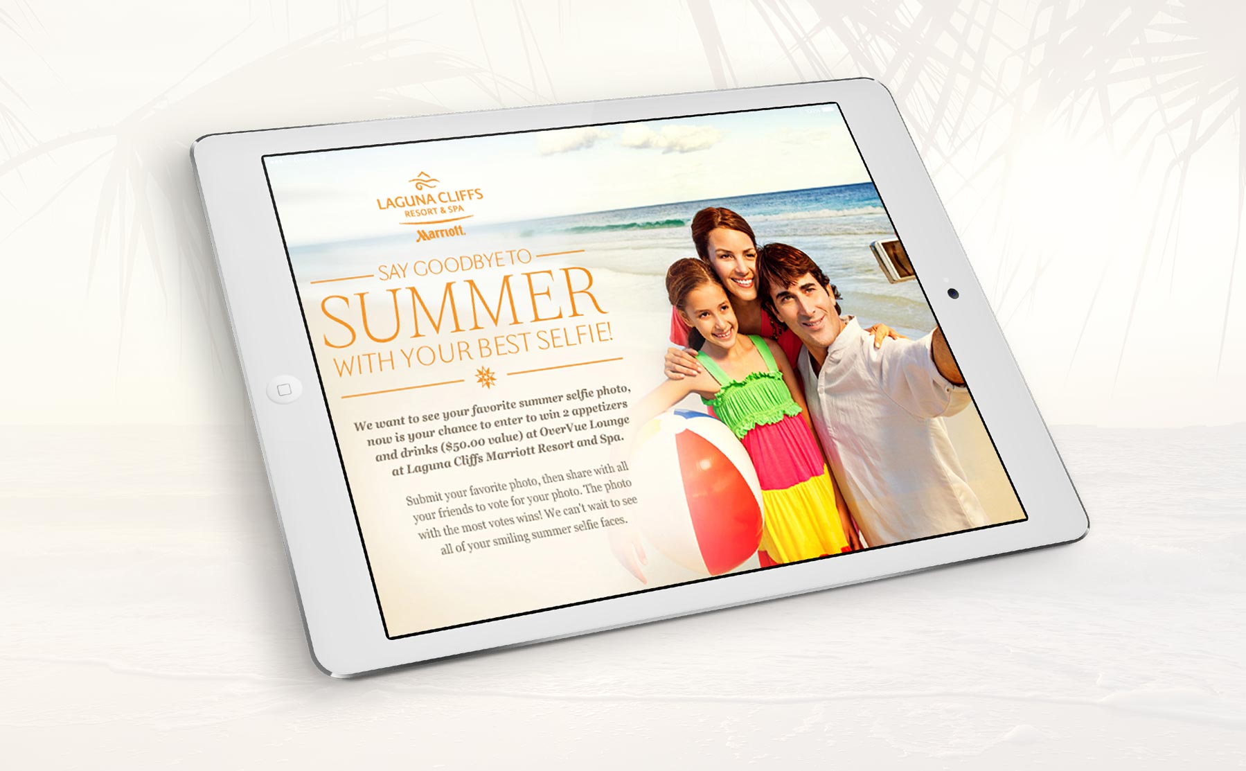 A family takes a selfie on the beach, displayed on a tablet with a Say Goodbye to Summer message.