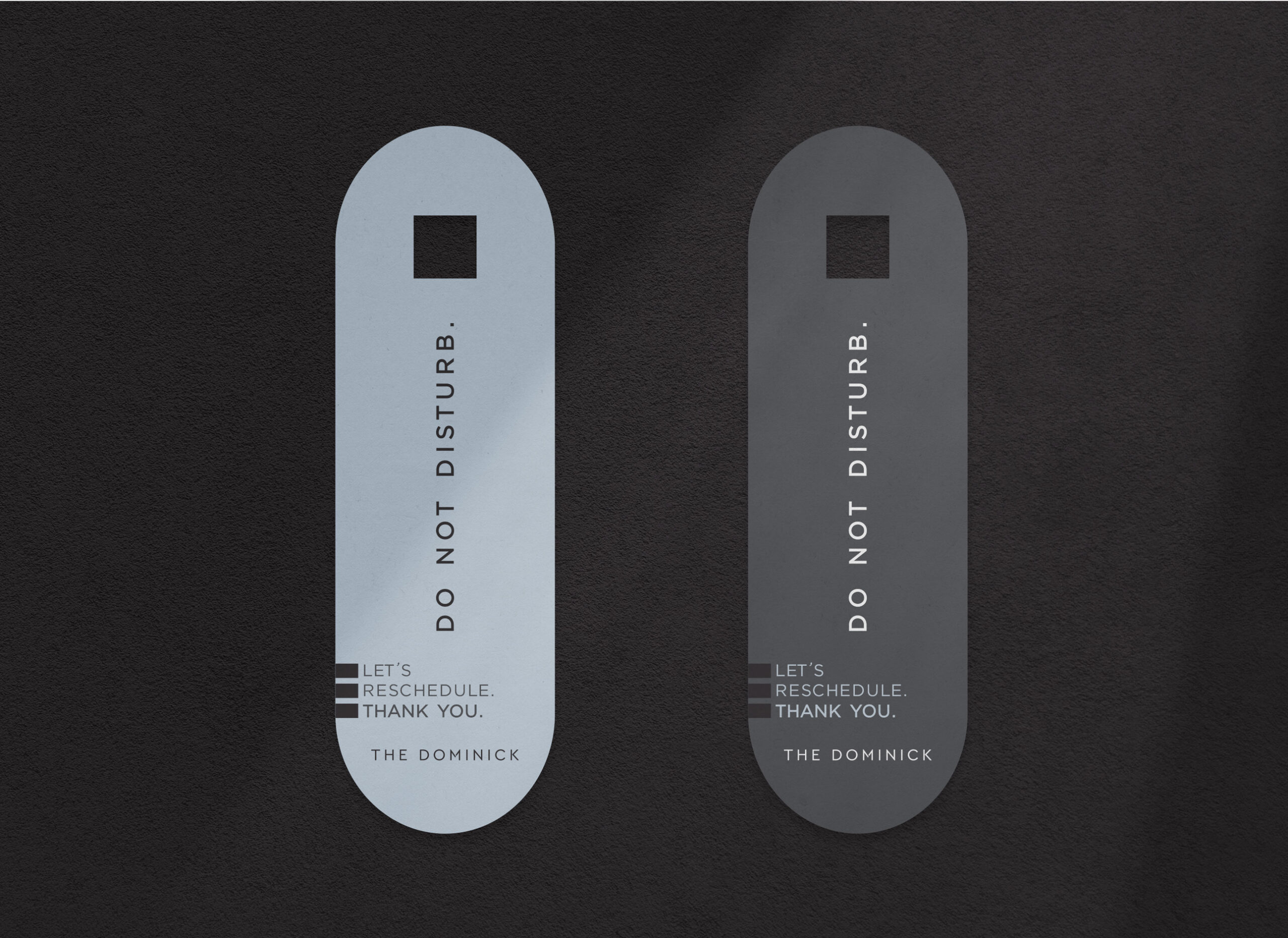 Two door hangers read DO NOT DISTURB. Lets reschedule. Thank you. THE DOMINICK on a dark background.